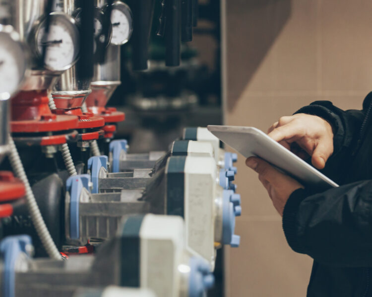 engineer working on maintenance in boiler room